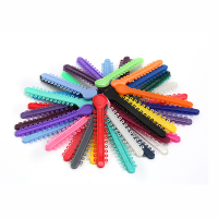 Elastomeric ligature ties